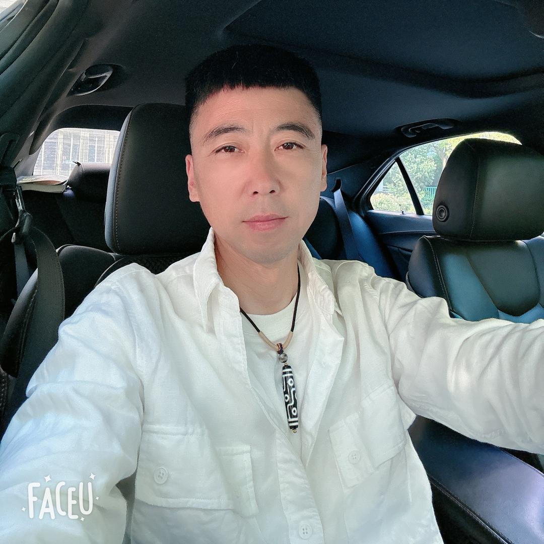 骑着灰机去看海