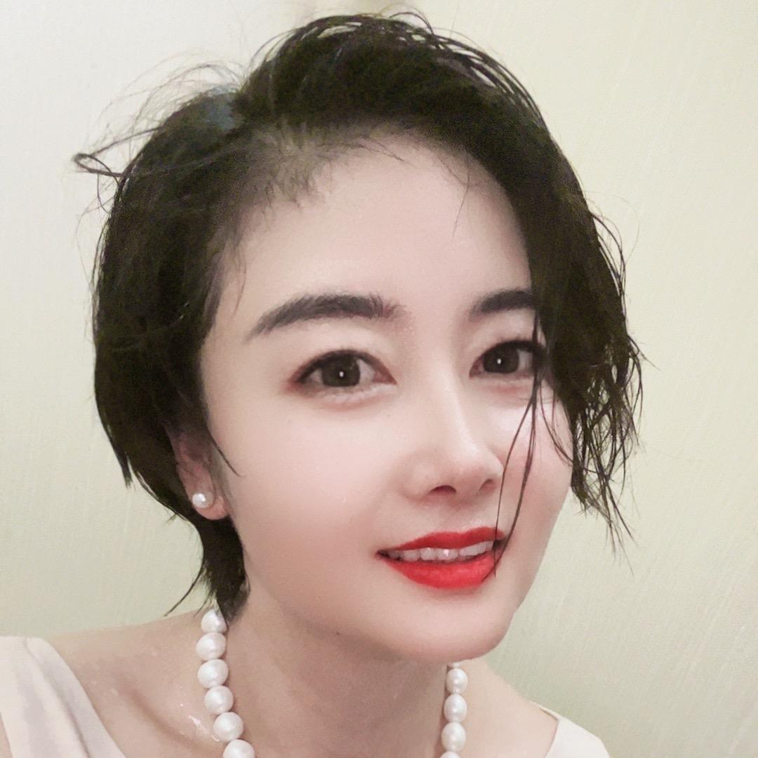 妩媚一笑💃