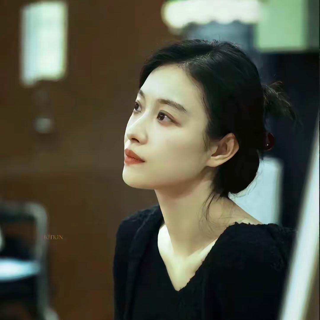 亦