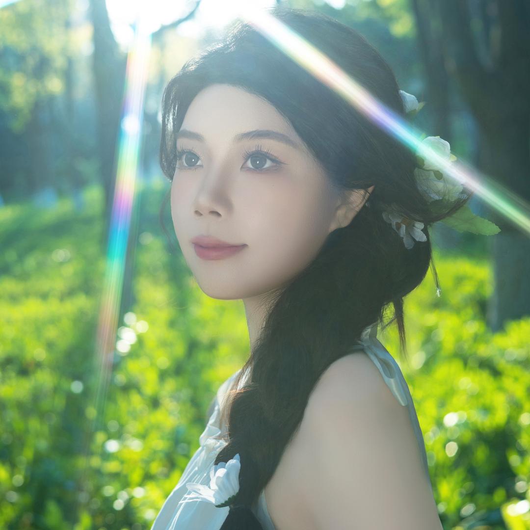 槿然.