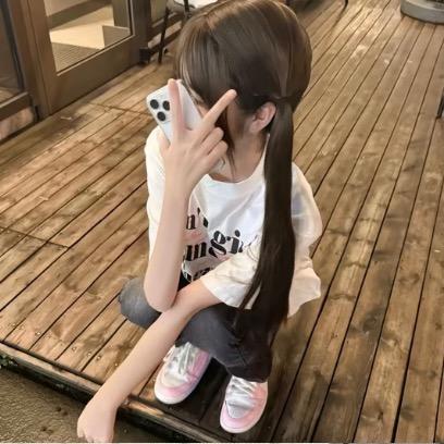 七七
