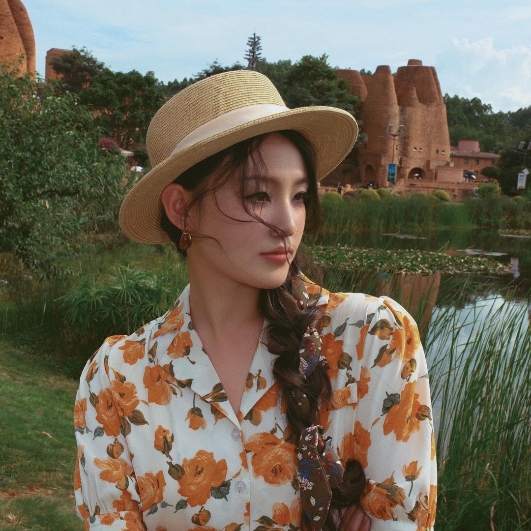 容么么(女摄影师)