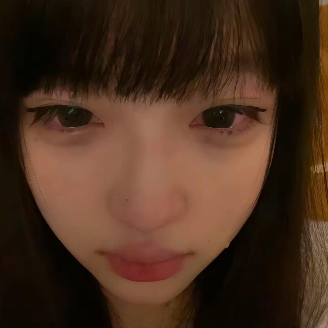 七七