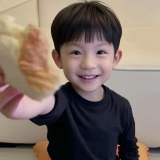陳.