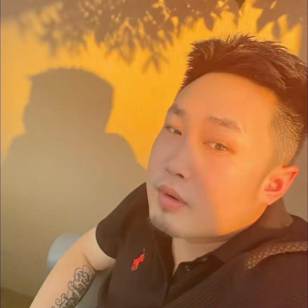 袁哲（教剪发）