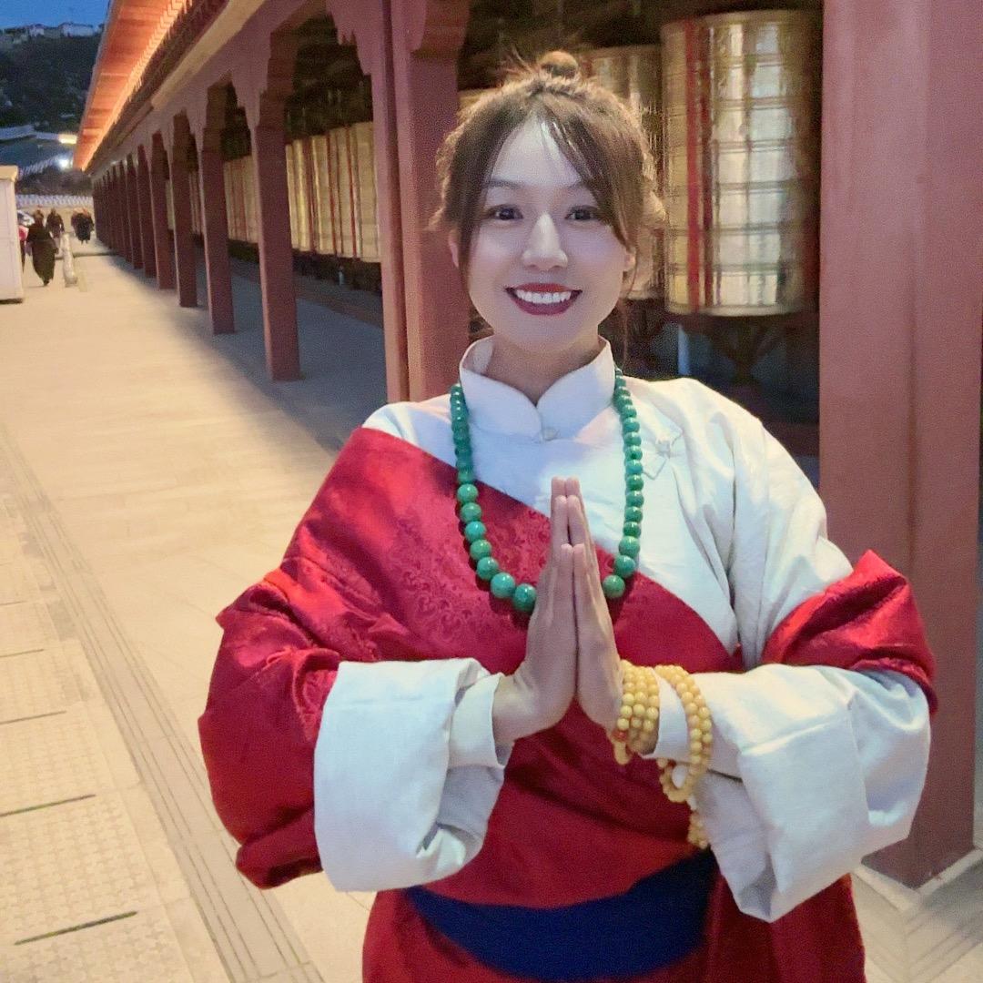 九妹百