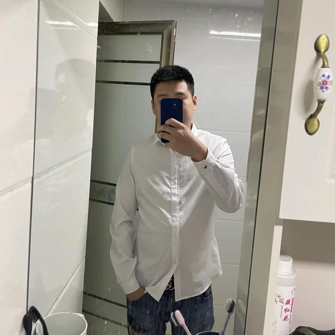 邱百万.