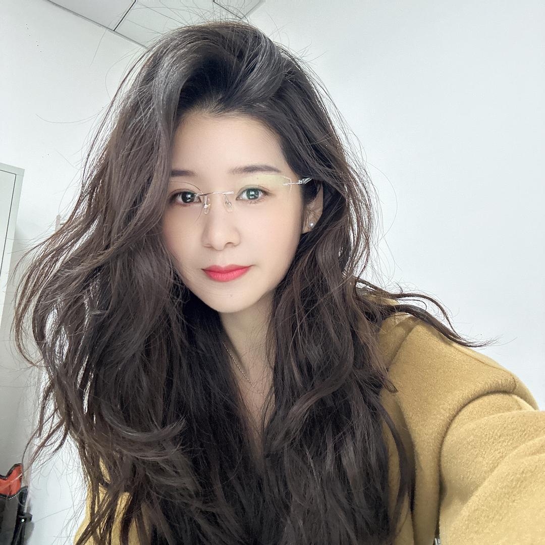 谭大美。