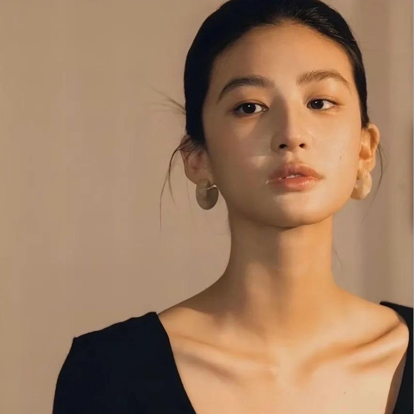 柒月.