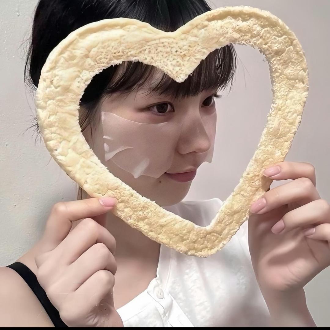 七七