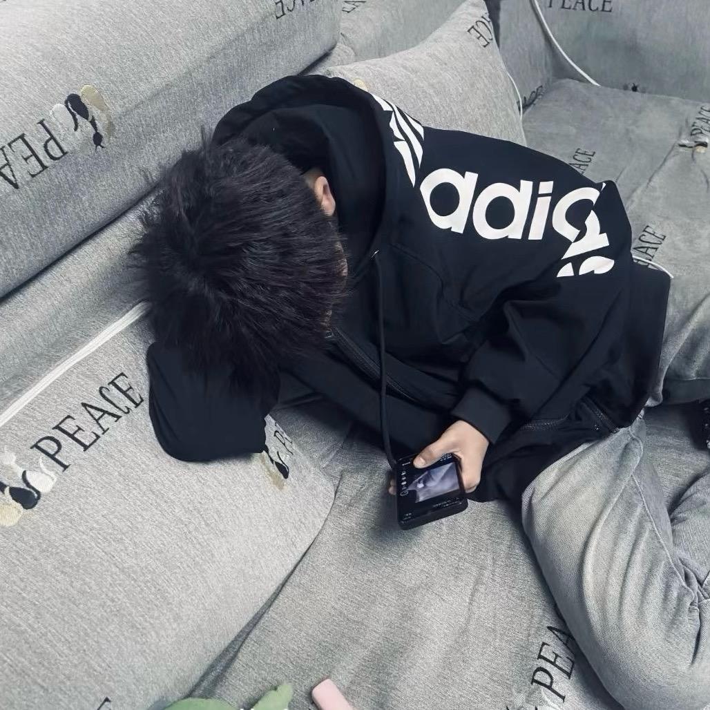 -77^