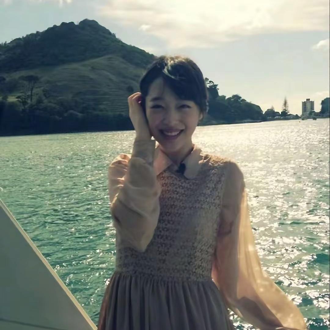 M^-^