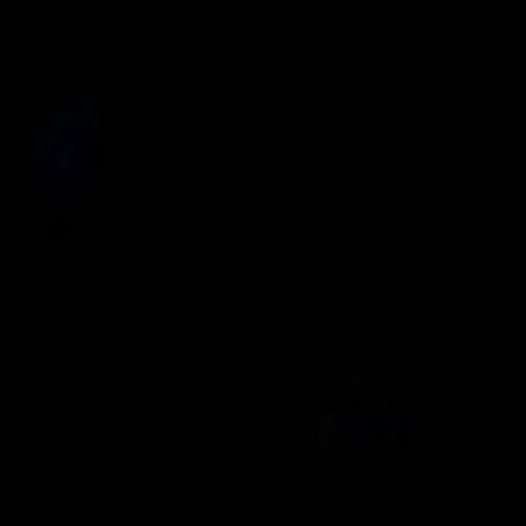 T.