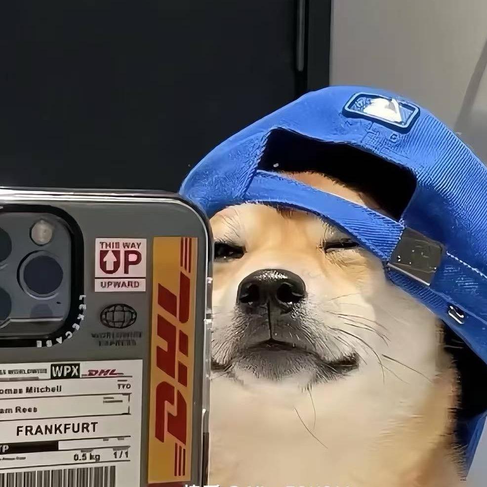 覃十三 