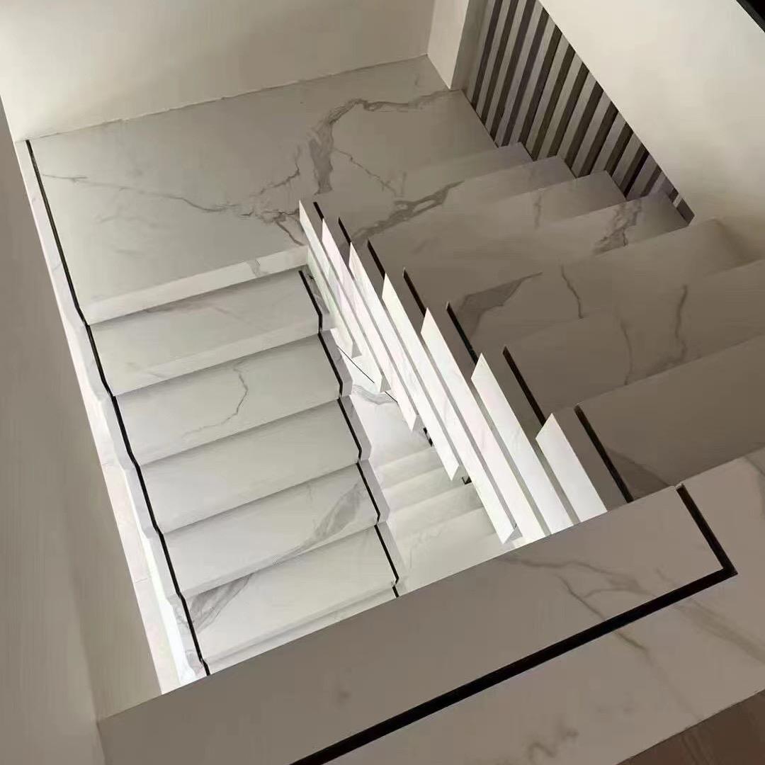 泰州岩板 石材 艺术钢板楼梯设计