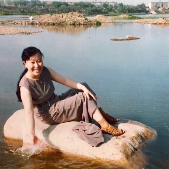 莉莎.