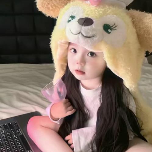 潼.