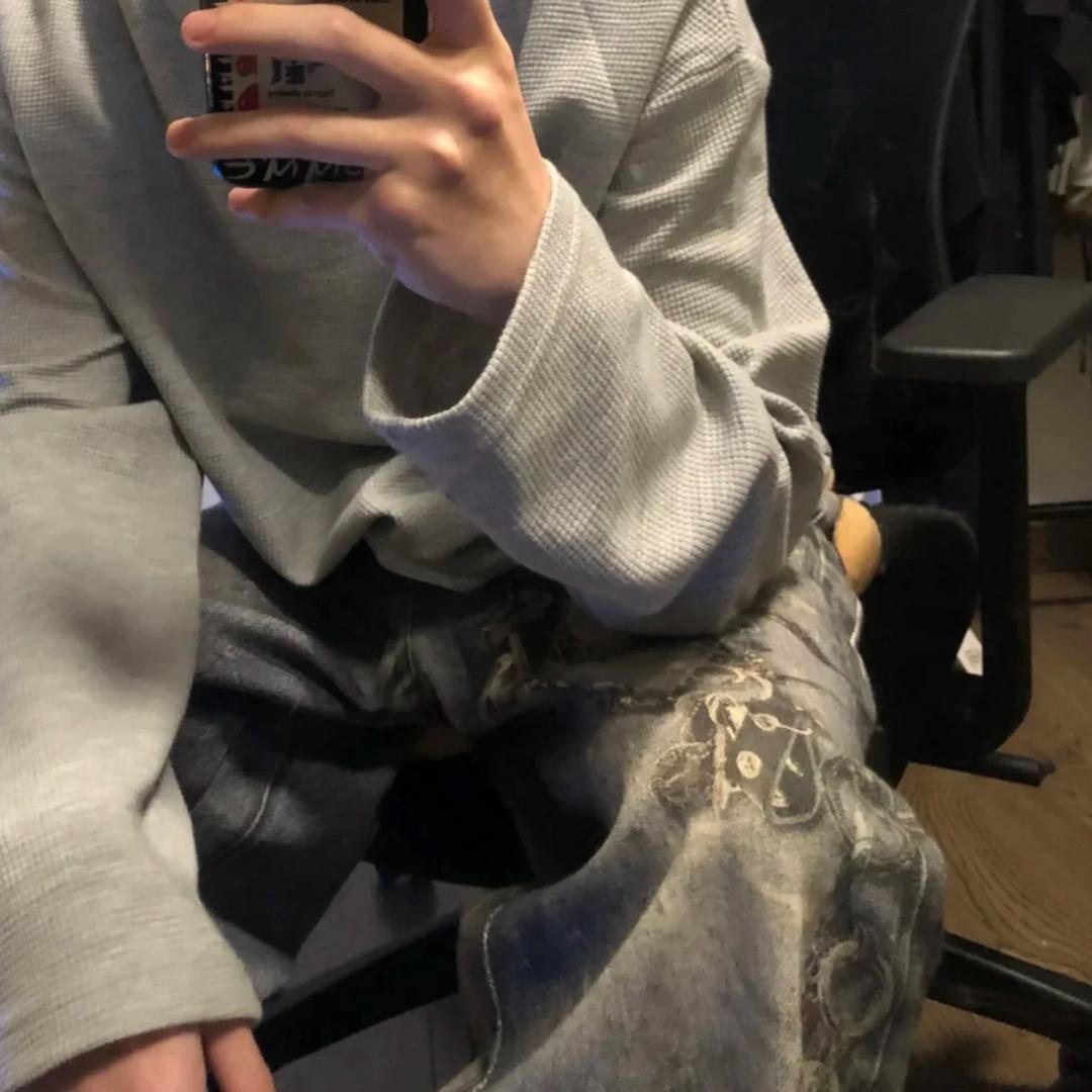 L.