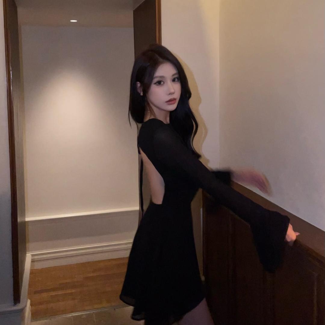 L.