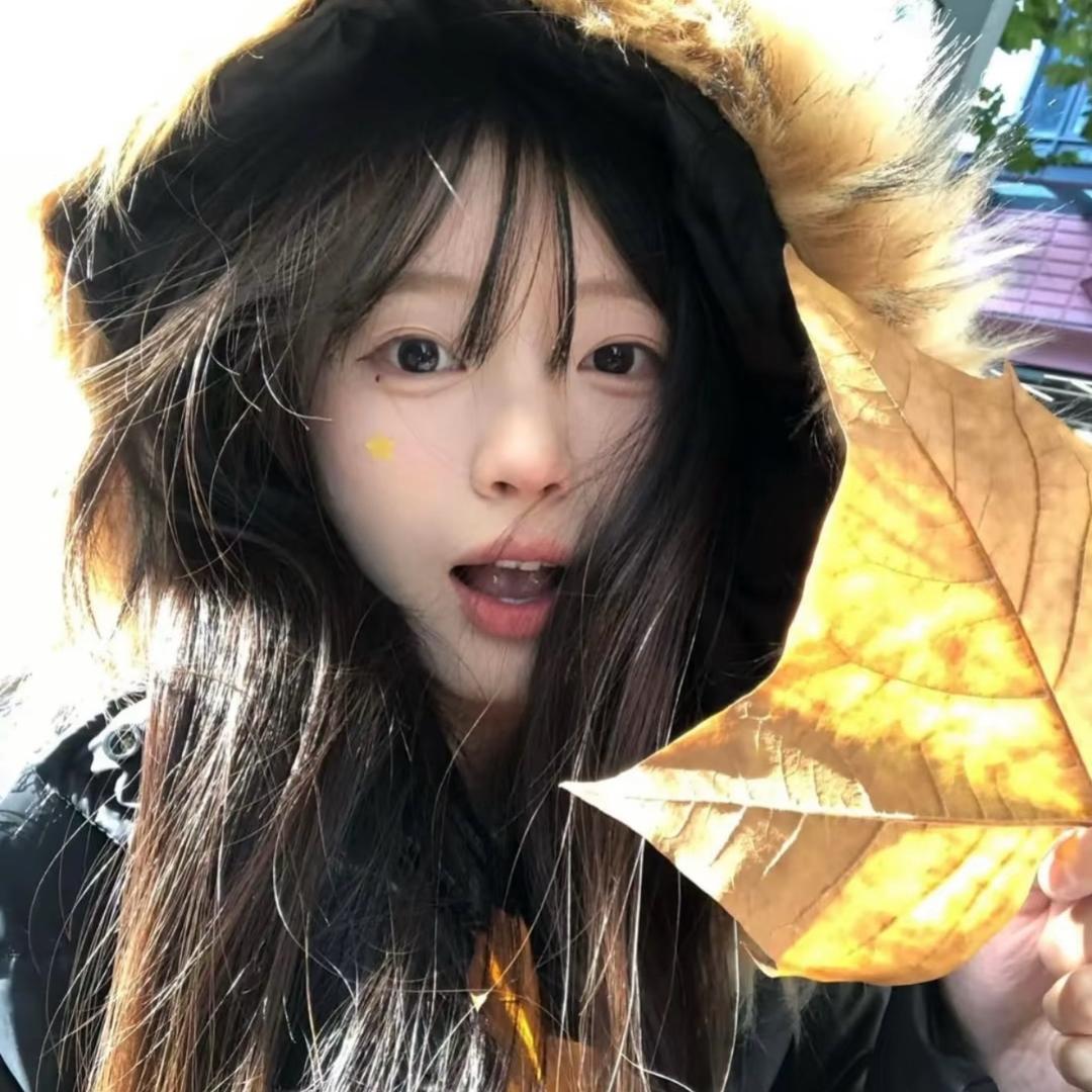 妮.
