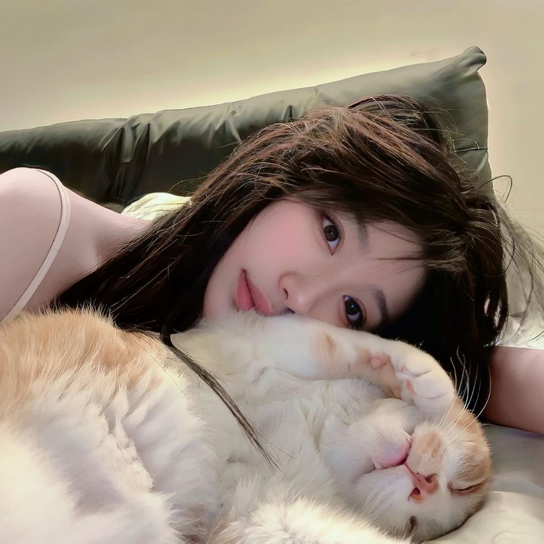 七七-