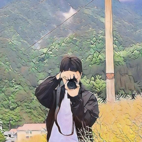 小梁同学📸