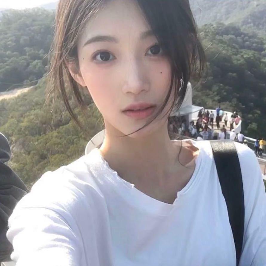 Yu77