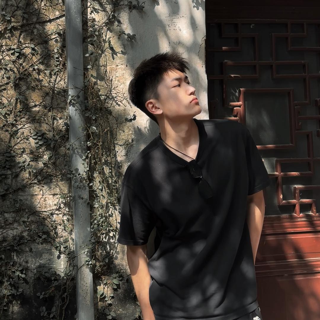不是李