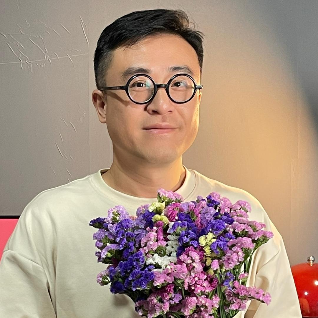 花摊大叔—老俞