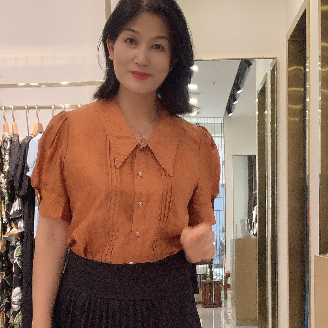 丁姐：服装梦奴娇