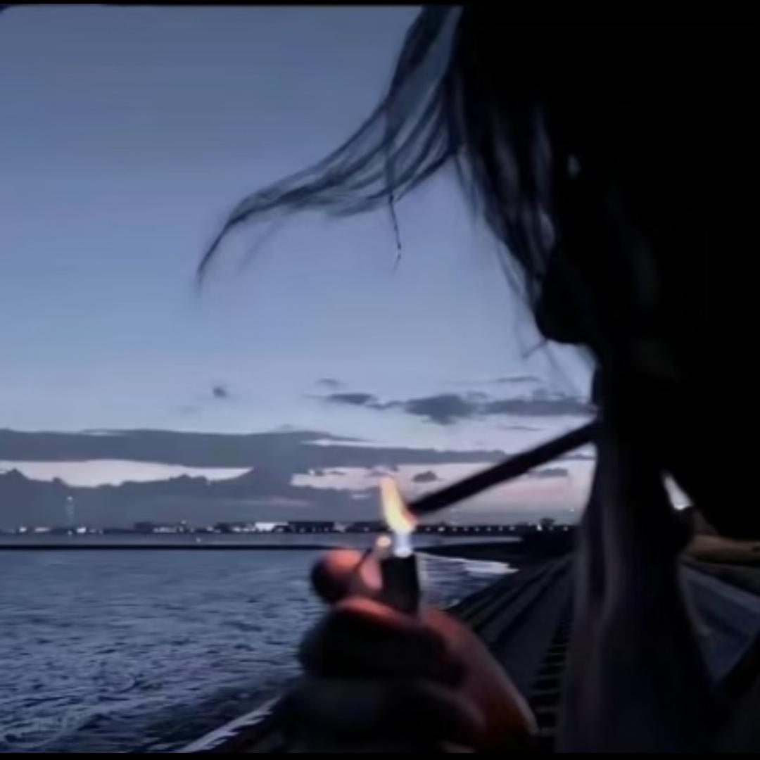 吣