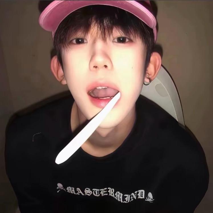 T.