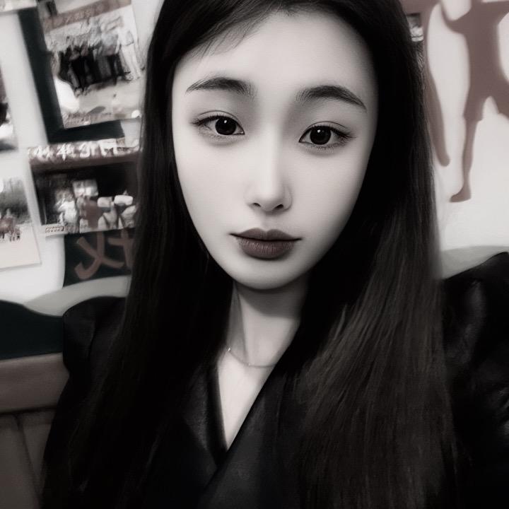 萱.