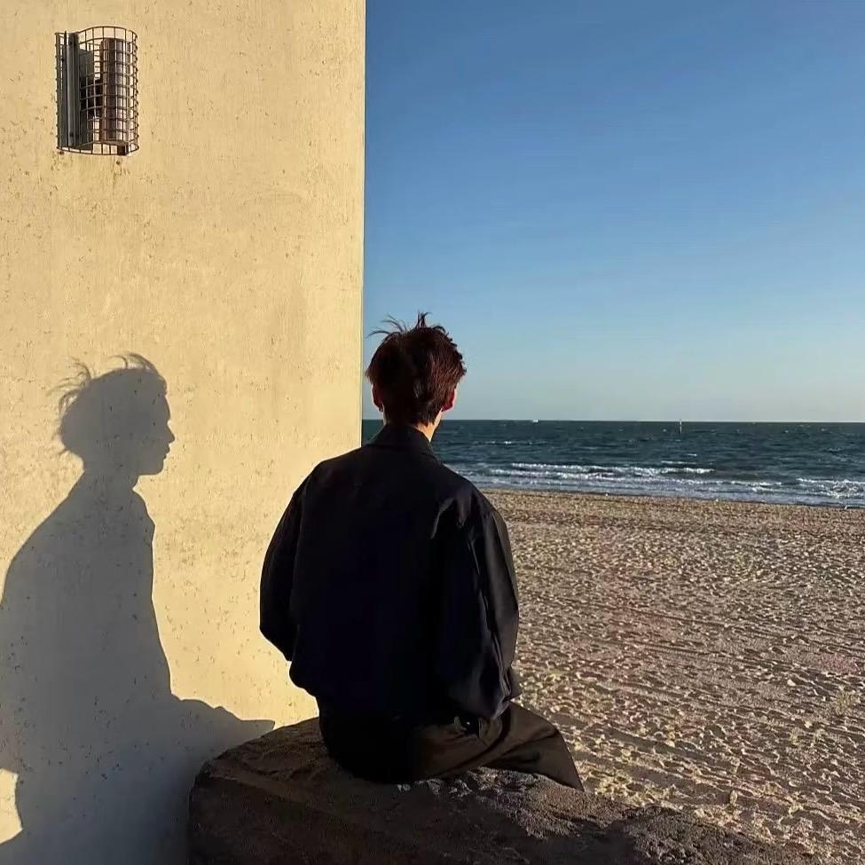 七七-