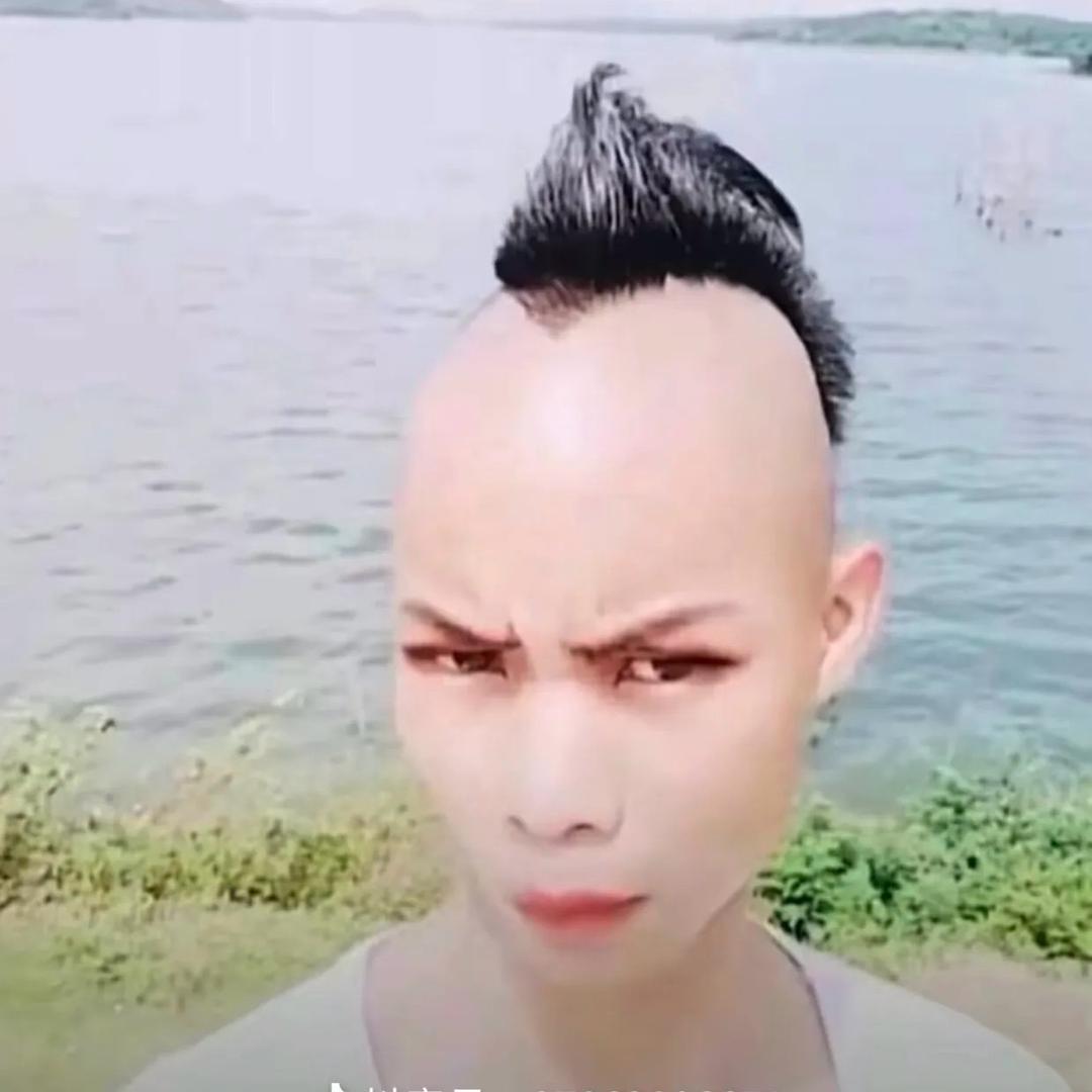 張  先  生.