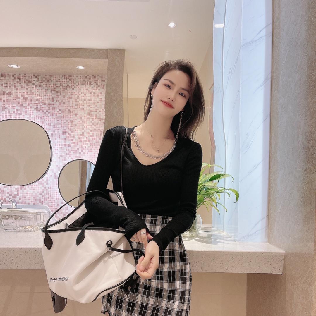 翁拉设计设批发女装大号