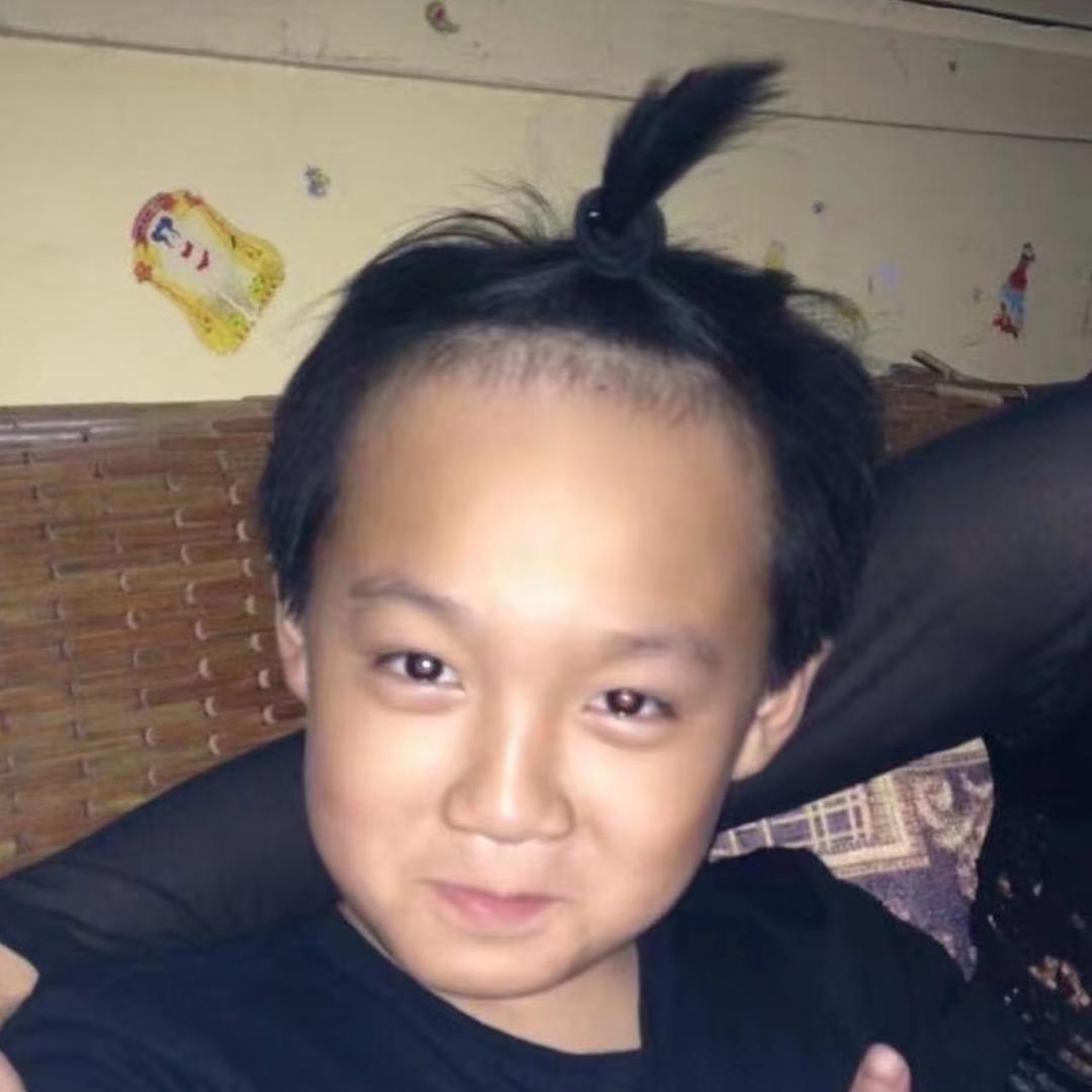 萬.
