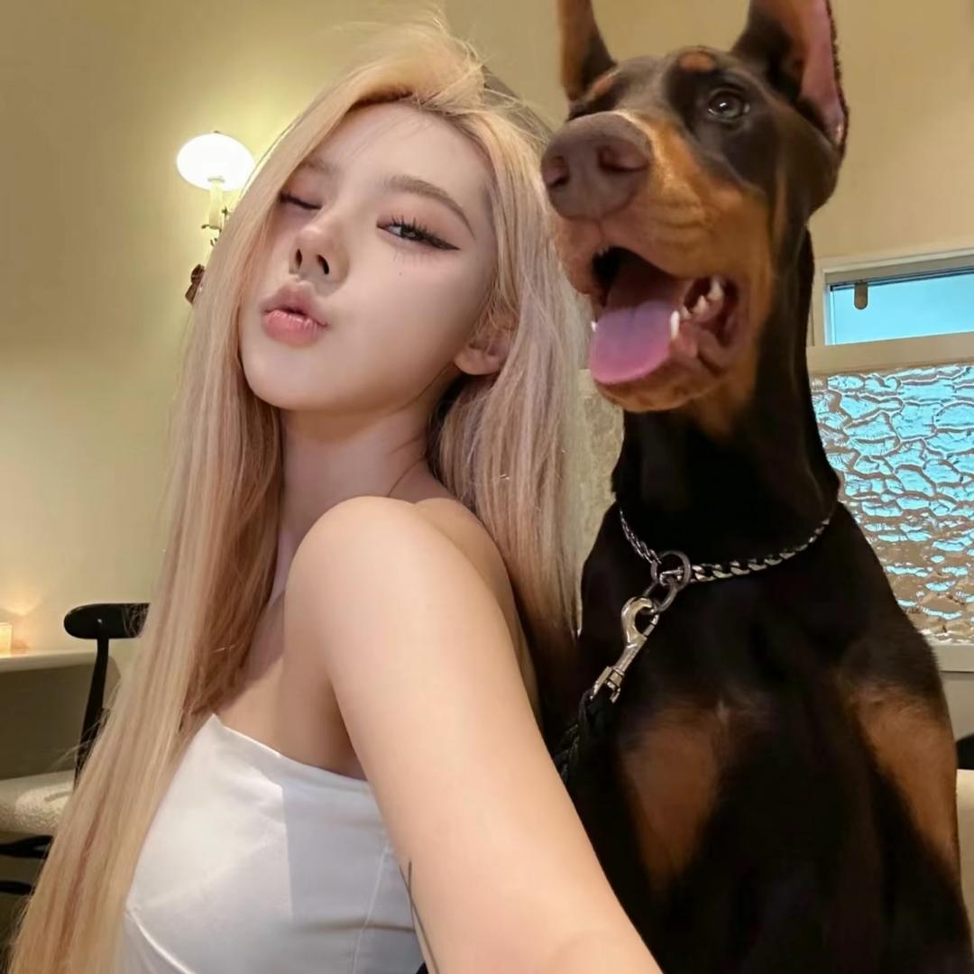 T.
