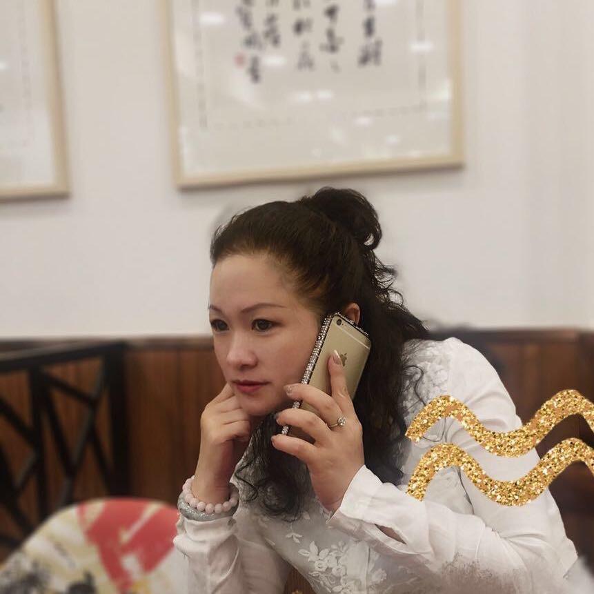 戚丽