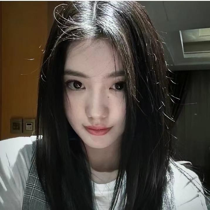 T.