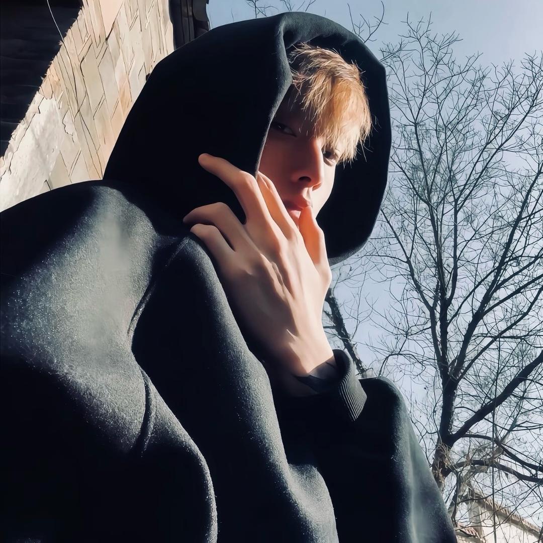 M.