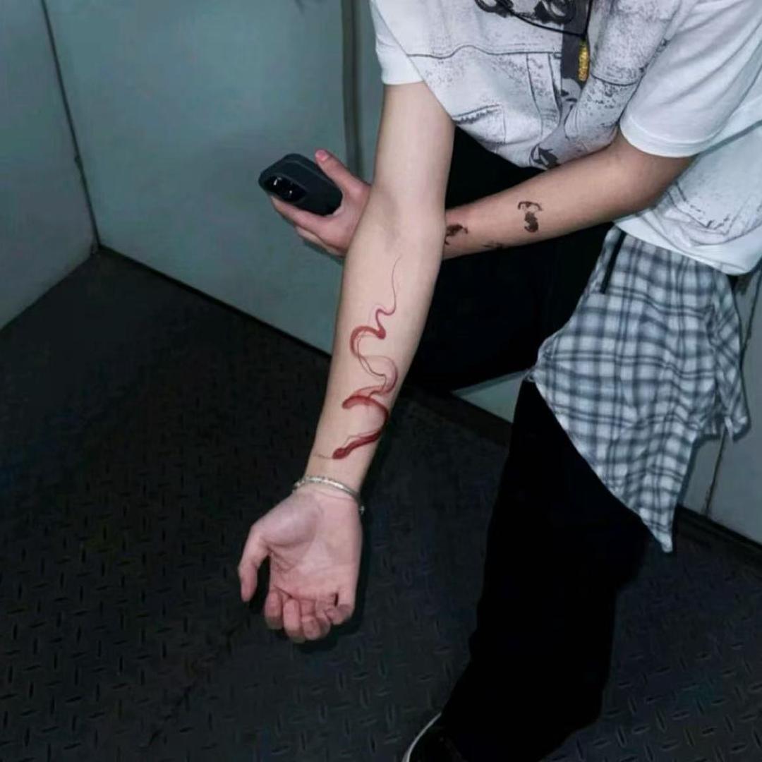 七七
