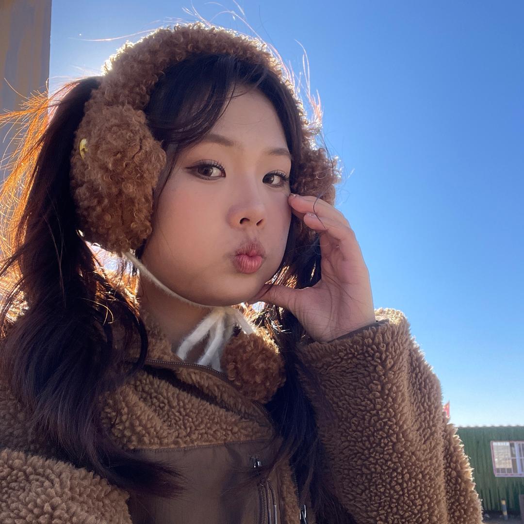 邱邱.