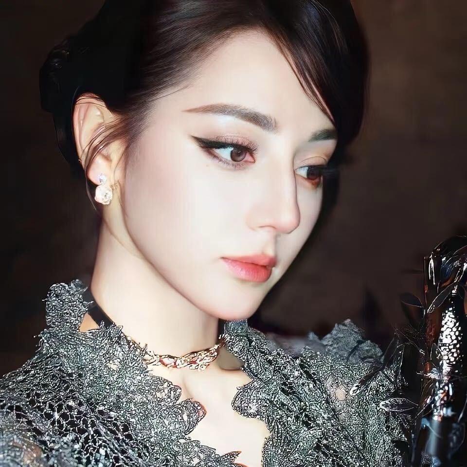 欣欣子/