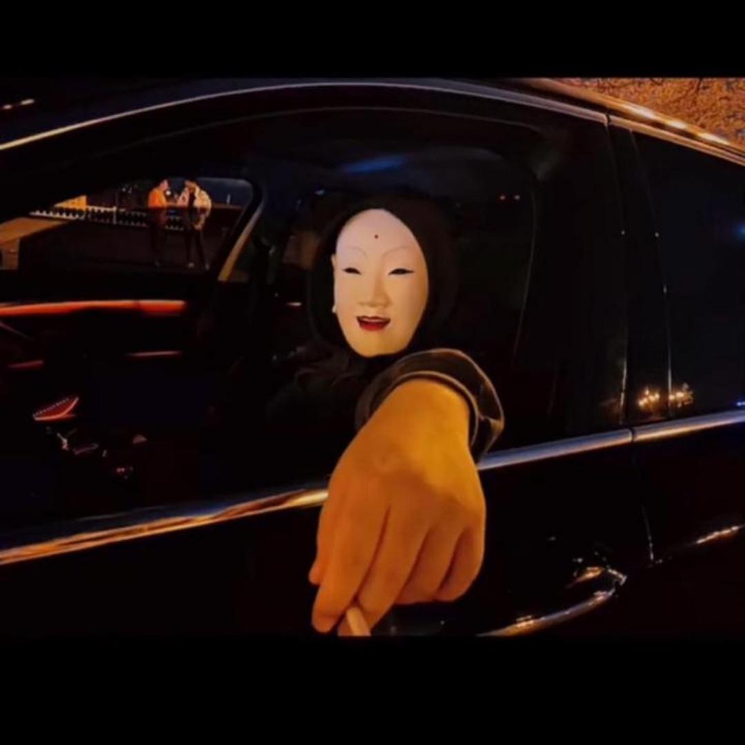T.