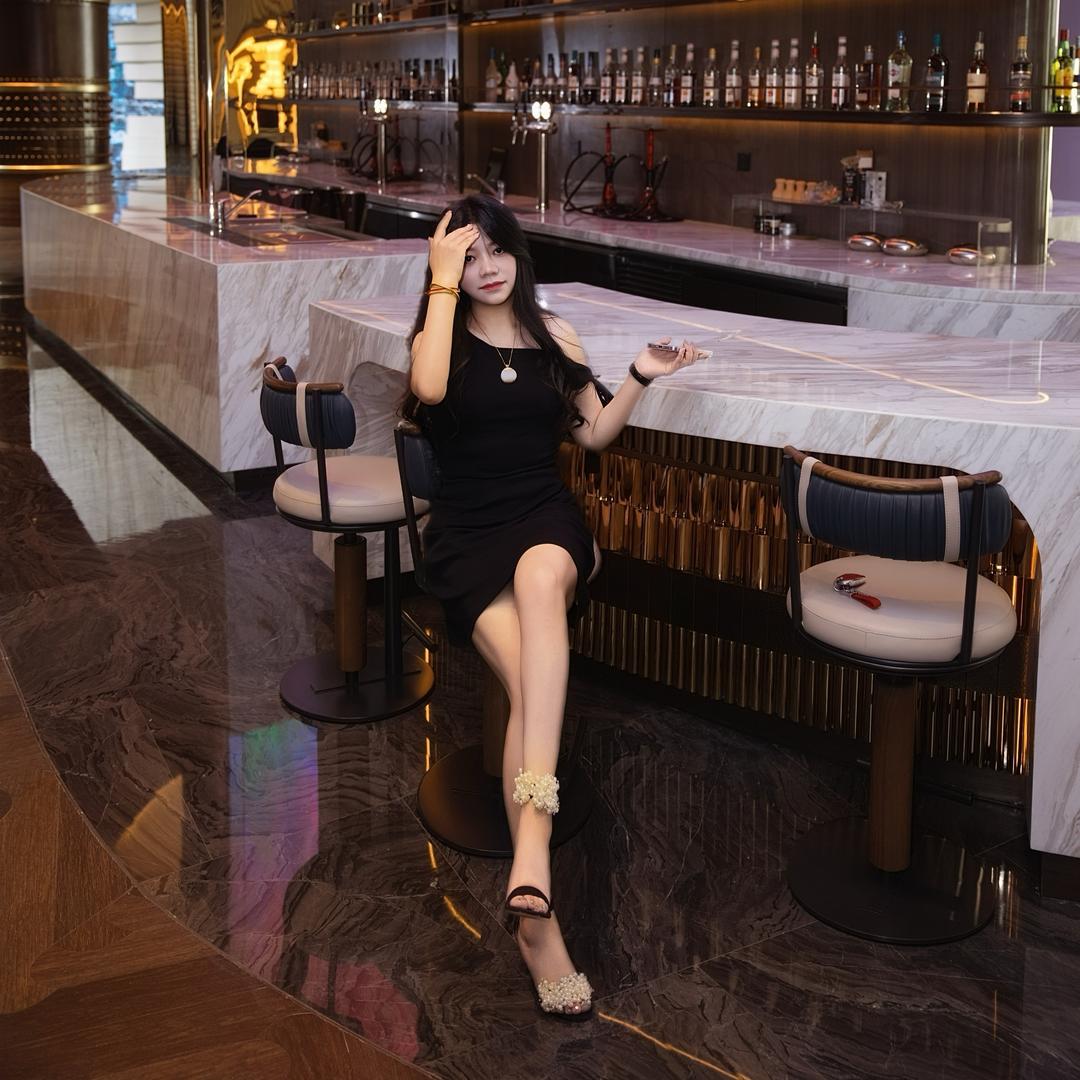L.