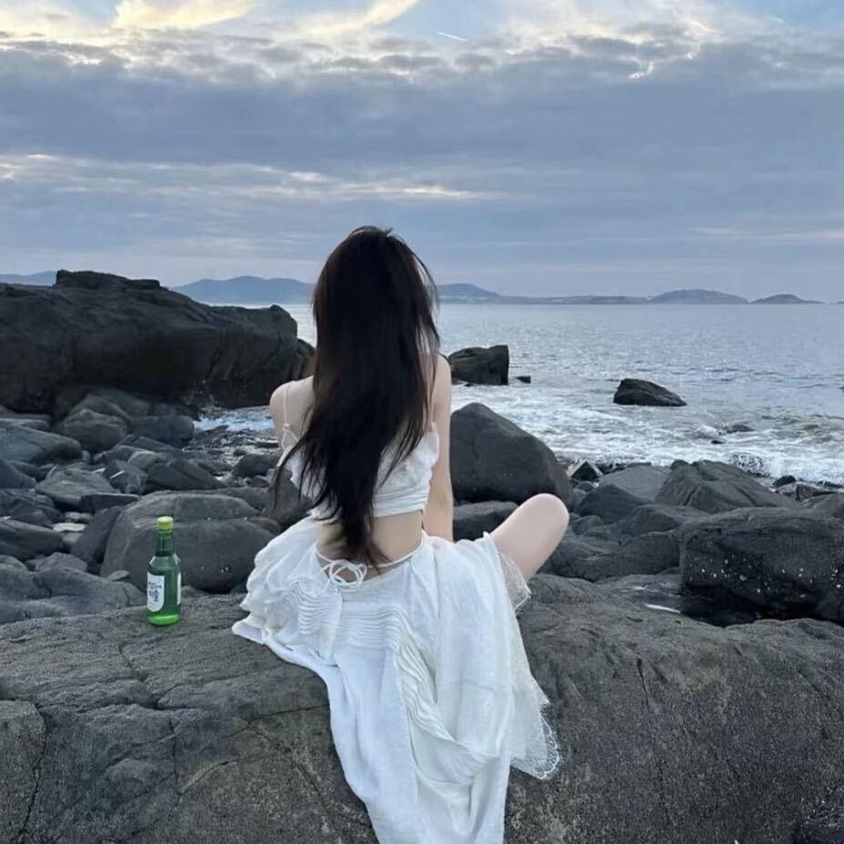 三三^