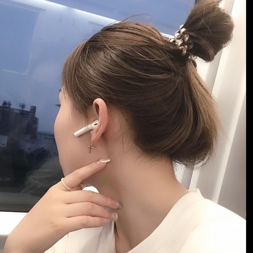 L.