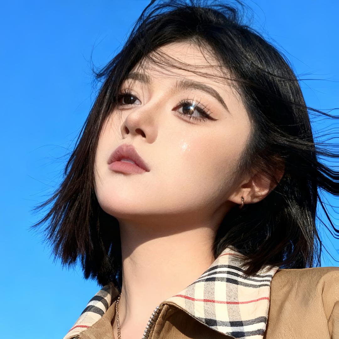 唐默.
