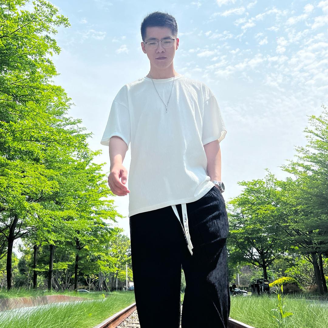 千默